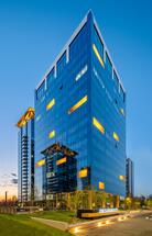 CMS expands its office space and extends on a long term its lease contract at One Tower